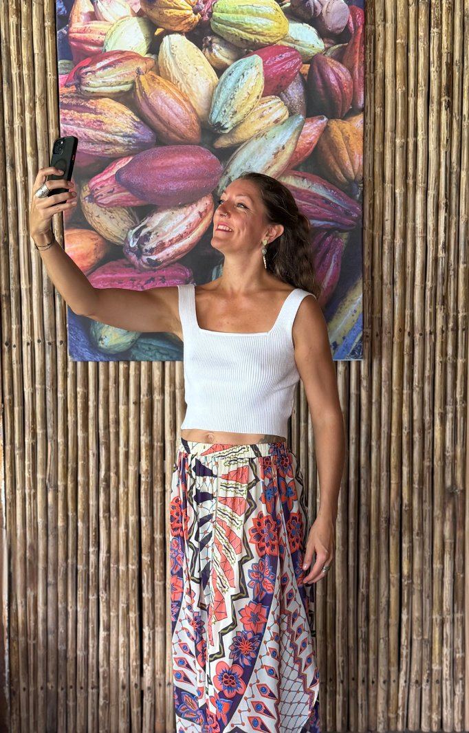 Judith filming content on her phone